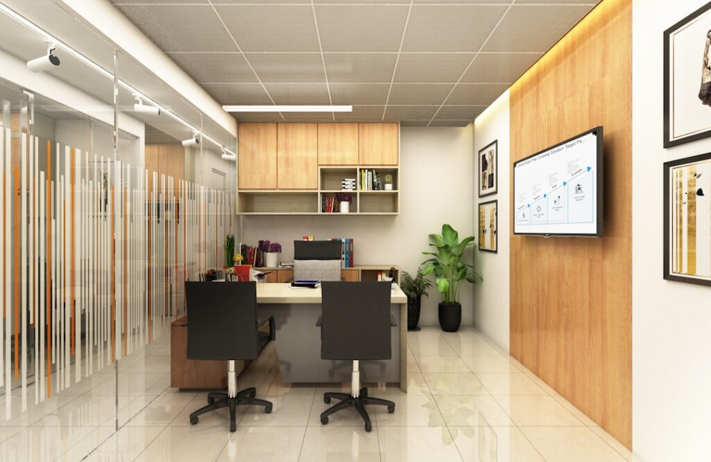 Modern corporate office fit-out interior with workstations and wood accents illustrating office fit-out cost per square foot in India